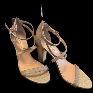 Gold glittery heel with ankle straps and zipper